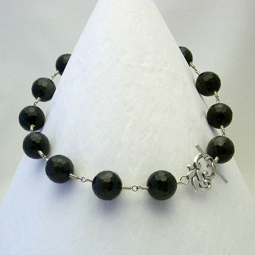 Rainbow Obsidian Necklace w/ a Sterling Silver Flower Clasp